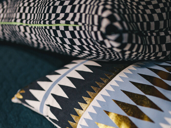 photo courtesy of kaboompics.com/photo/4216/close-up-of-pillows-on-a-bed quality decorative pillows1